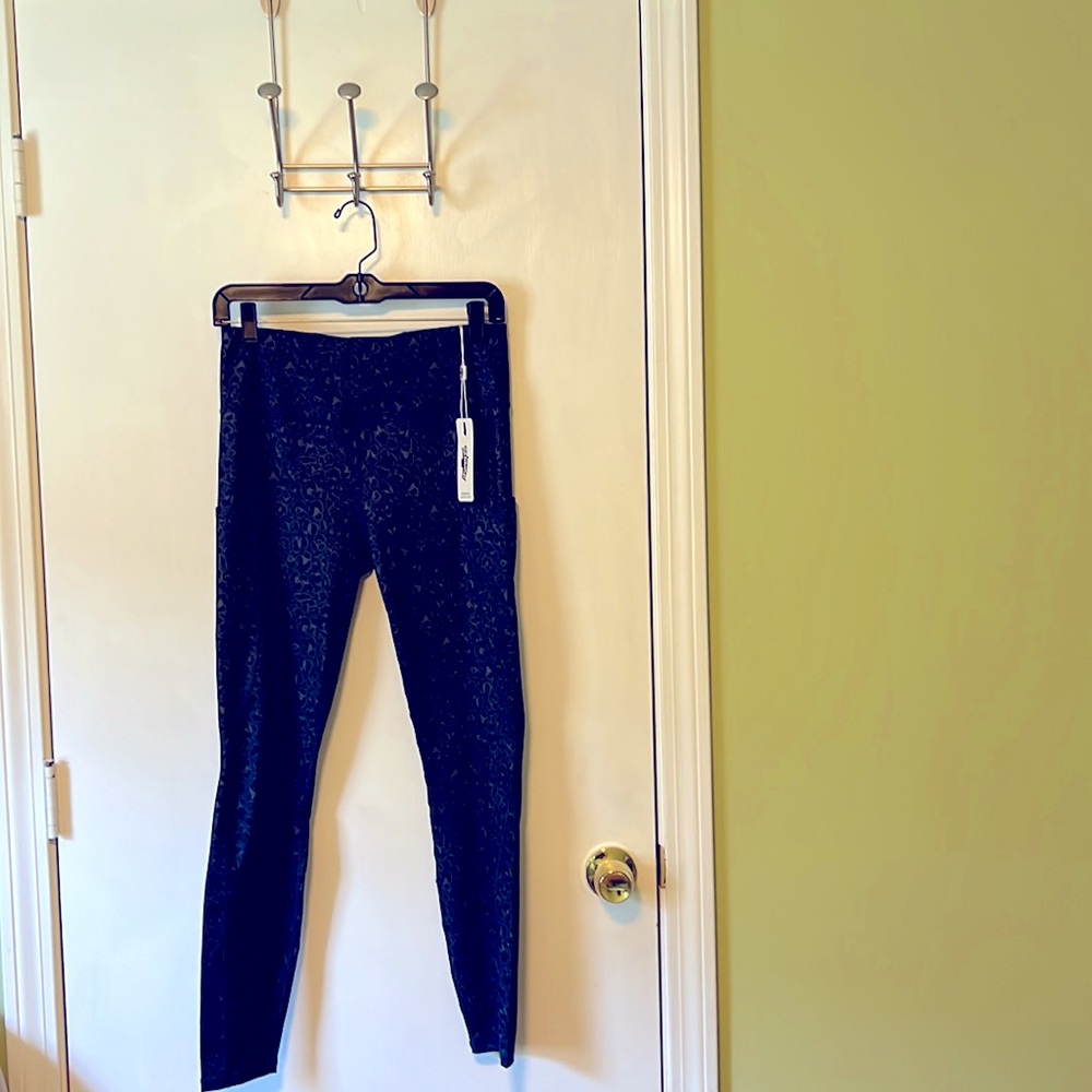 Blue and black leopard print leggings, brand new, size large, tags attached.